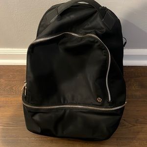 Black and gold Lululemon Backpack